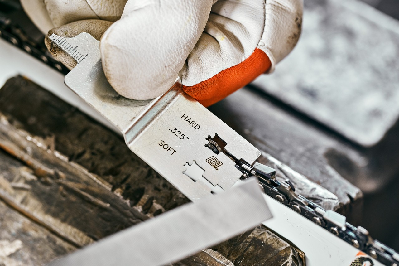 A filing gauge is used to adjust the depth gauge on a STIHL saw chain